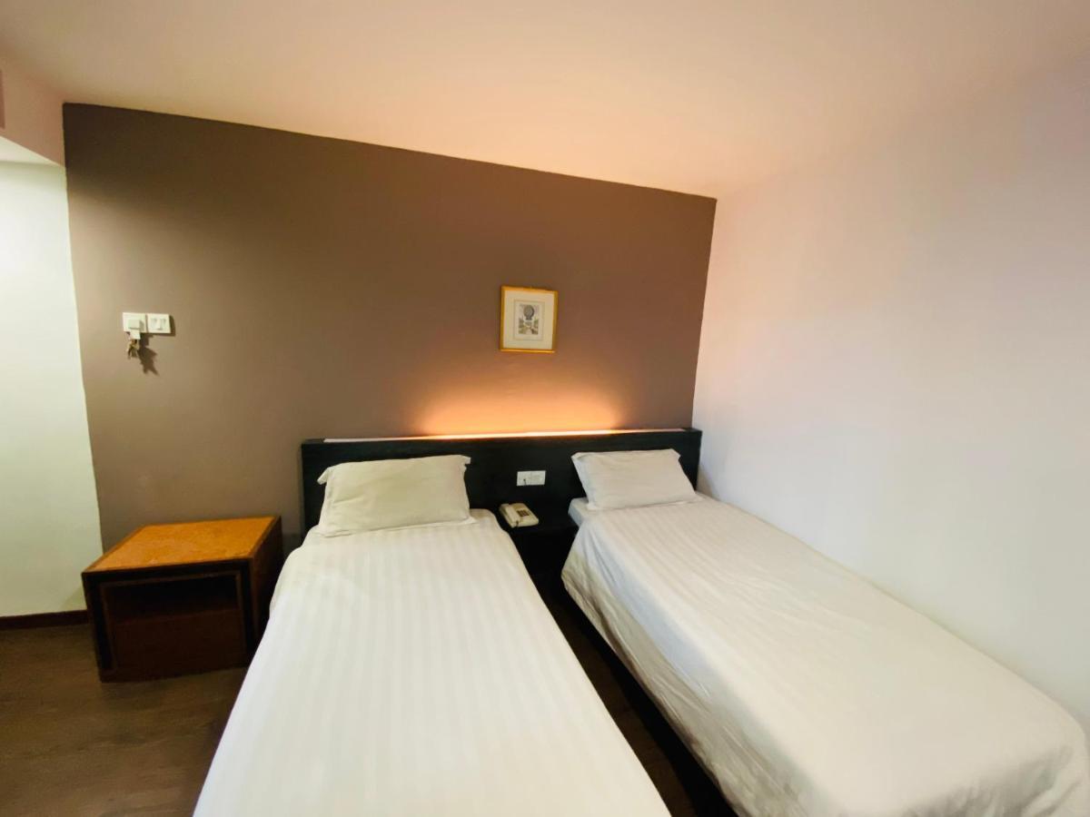 Ta Hotel Куала Лумпур Екстериор снимка